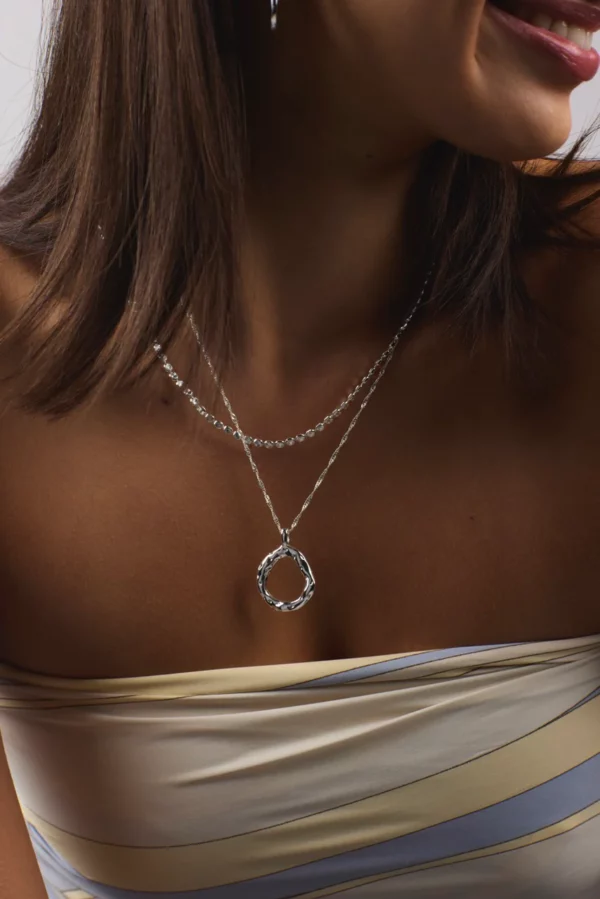 Silver belle necklace being worn